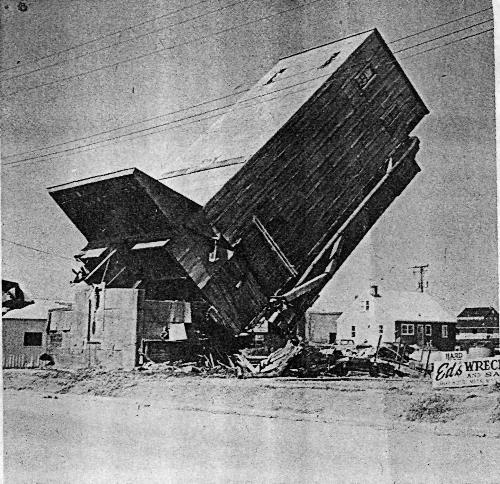 The toppling of the Chanhassen grain elevator - circa unknown