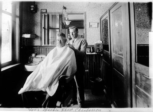 Joe Meuwissen, barber.  Jacob Jeurissen is the patron - Circa 1927