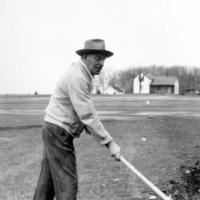 Joe Meuwissen working on ball park located at St. Hubert's Parish. circa 1947