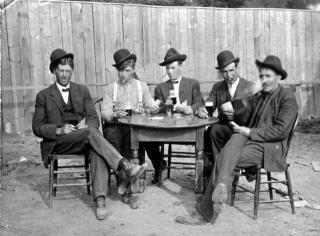 Albert Pauly, John Roeser, Bill Pauly, Frank Lenardo and unidentified  person playing cards. circa 1915