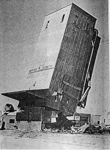 The toppling of the Chanhassen grain elevator - circa unknown