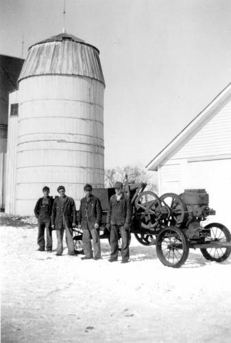 Portable baler on the John & _____ Kerber farm - circa 1940's