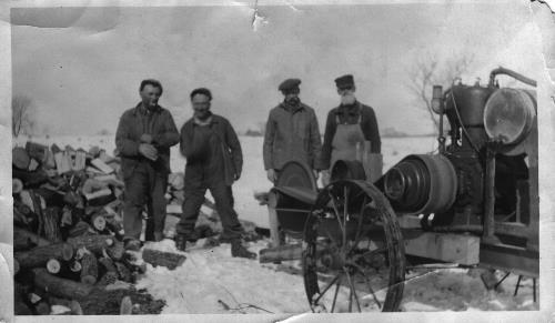 Cutting wood on Paul & Appolonia "Franie" (Heibel) Vogel's farm located at 105 Pioneer Trail - circa late 1920 's