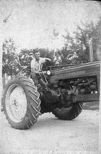 Roger Bongard on 1944 John Deere 'A' tractor - circa 1945-1946