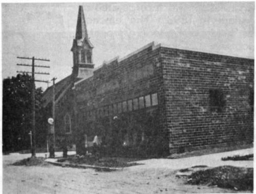 Pauly building across from St. Hubert's Church on main street - 1966